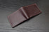 dark brown leather bifold wallet